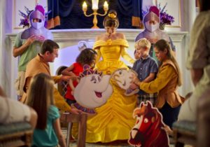 Each portraying a character from the Disney animated classic "Beauty and the Beast," Magic Kingdom guests join Belle and Lumiere in a fun-filled storytelling adventure at Enchanted Tales with Belle. The interactive character experience is part of New Fantasyland at Walt Disney World Resort in Lake Buena Vista, Fla. (Kent Phillips, photographer)